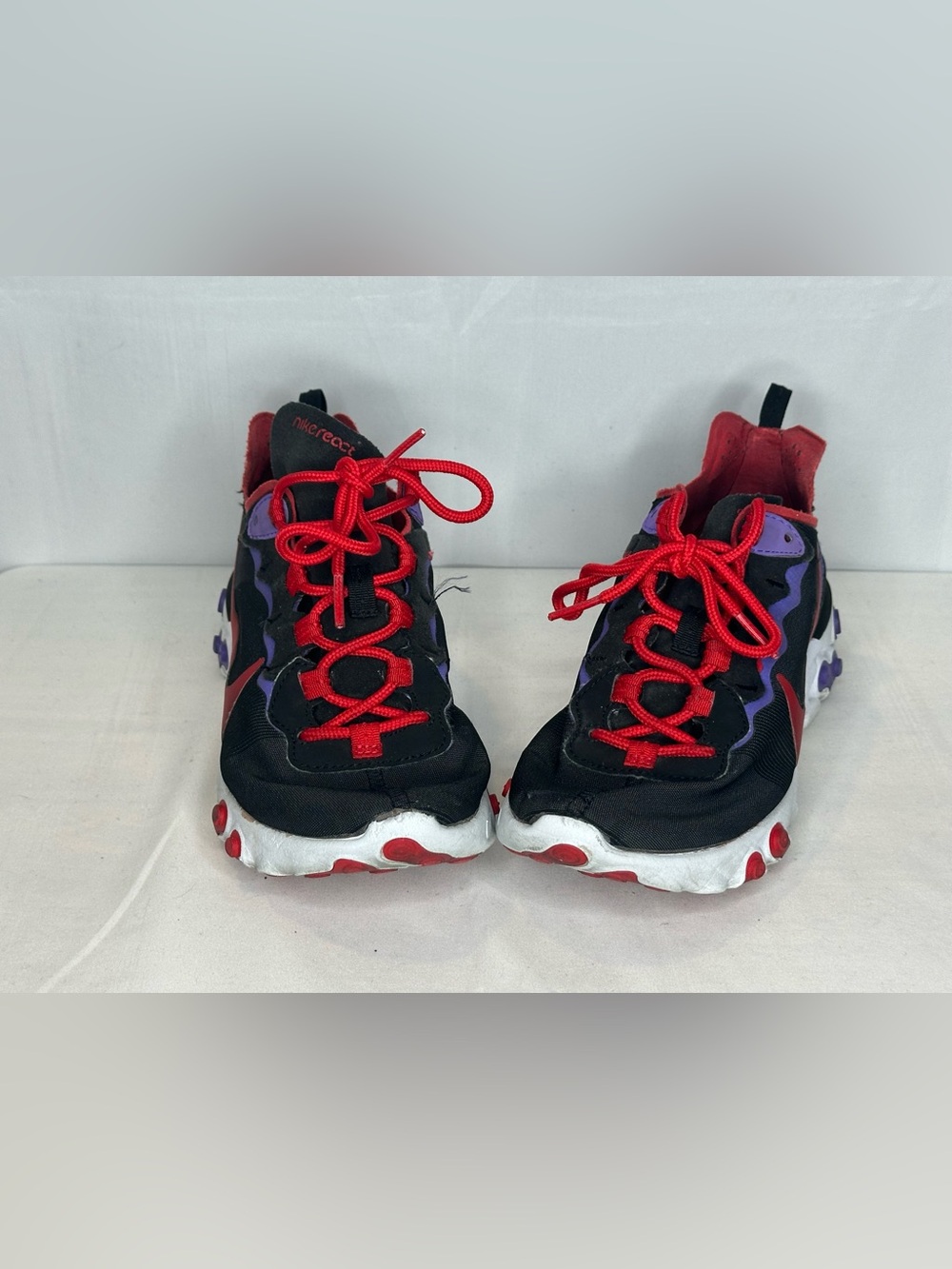 Nike Kids Black Sneakers with Red Laces and Purple Accents